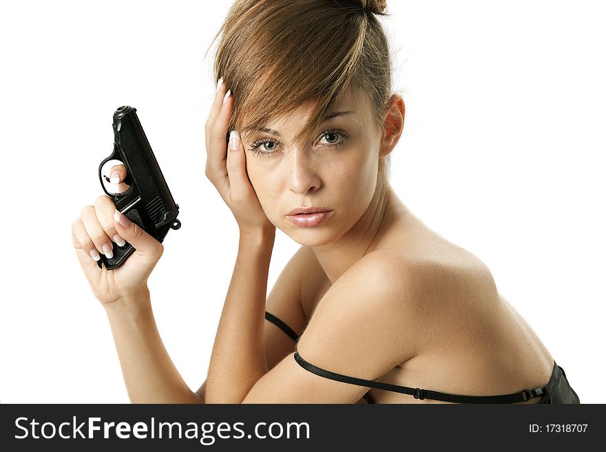 Attractive young woman with handgun over white