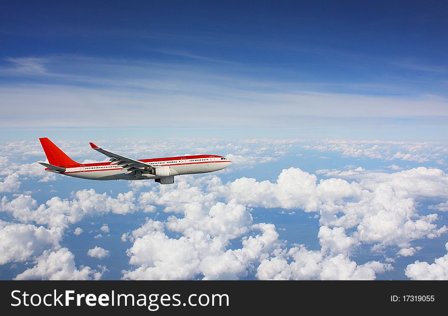 The red plane flying on sky