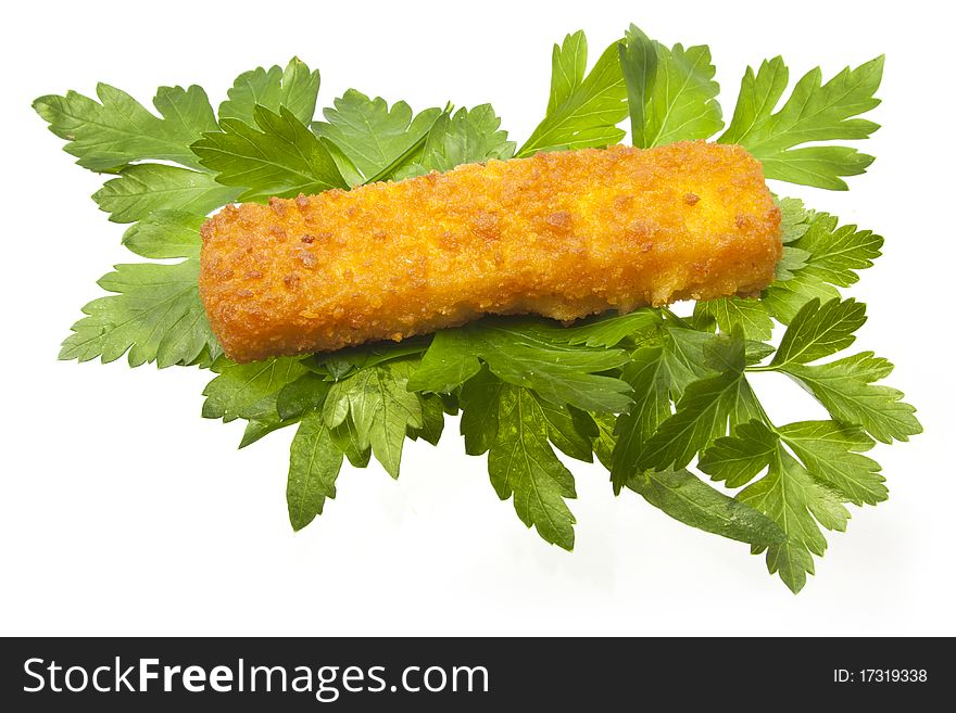 Fish stick isolated on white with some parsley. Fish stick isolated on white with some parsley