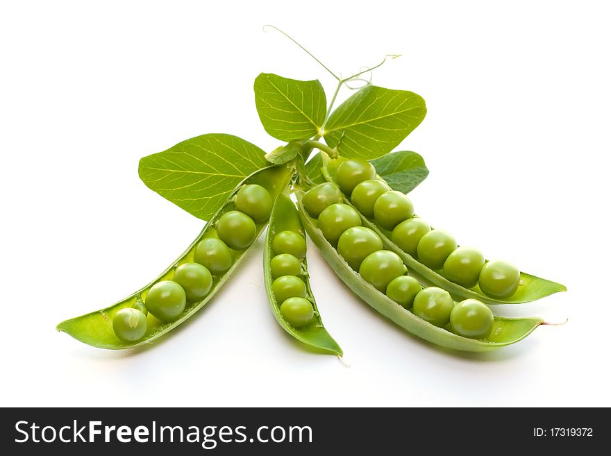 Green peas on a white background