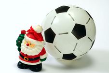 Santa Claus And The Soccer Ball On White Stock Photos