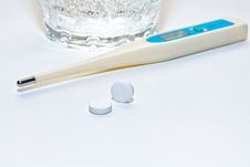 Thermometer And Tablets Stock Photo