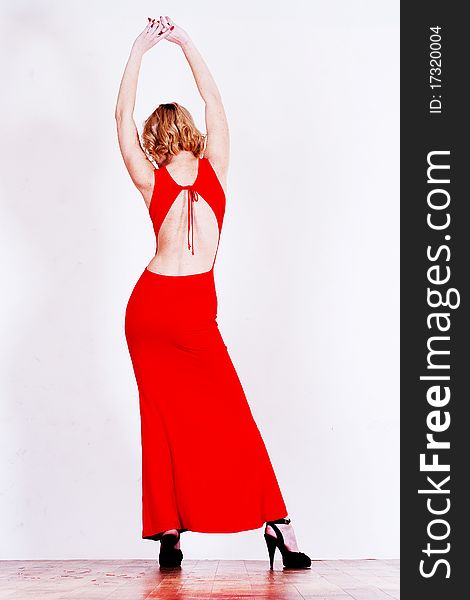 Silhouette of skinny women in red dress