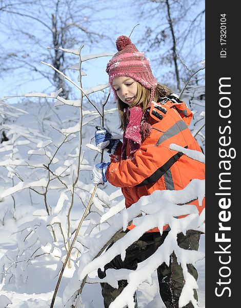 Child playing with snow