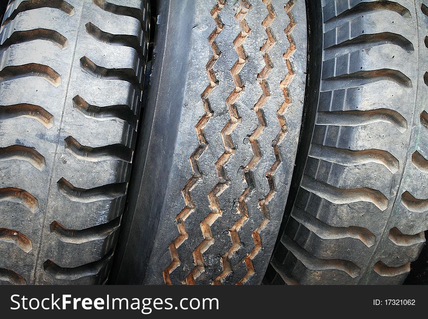 Old car tires in the second hand market. Old car tires in the second hand market