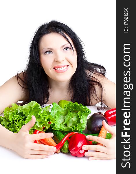 Beautiful woman  with vegetables over white background