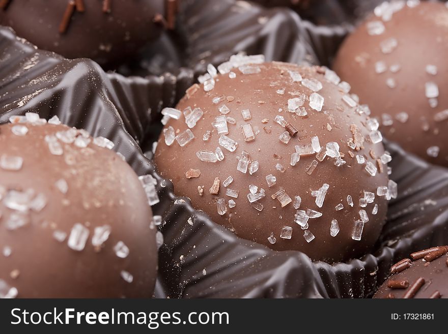 Truffle candy coated chocolate with decorative powdered for the occasion.