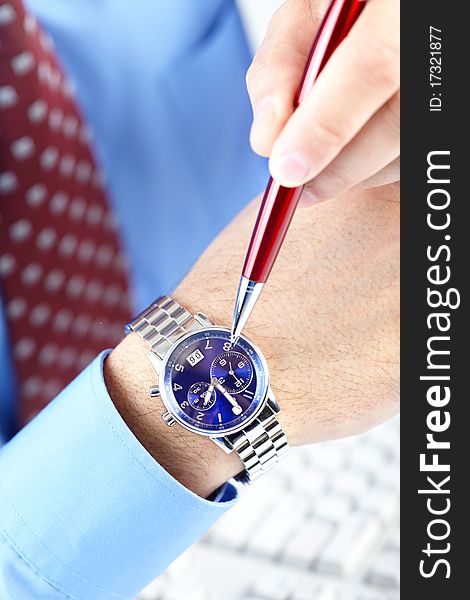 Businessman looking at the watch