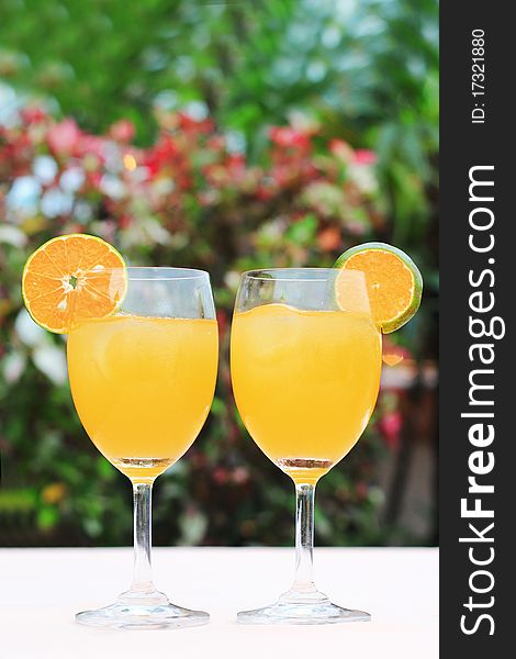 Close up of a couple glass of fresh orange juice