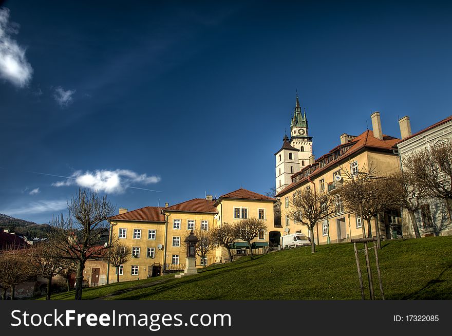The main square with skyline of town castle and the church of St. Katerina, Kremnica, Slovakia. The main square with skyline of town castle and the church of St. Katerina, Kremnica, Slovakia