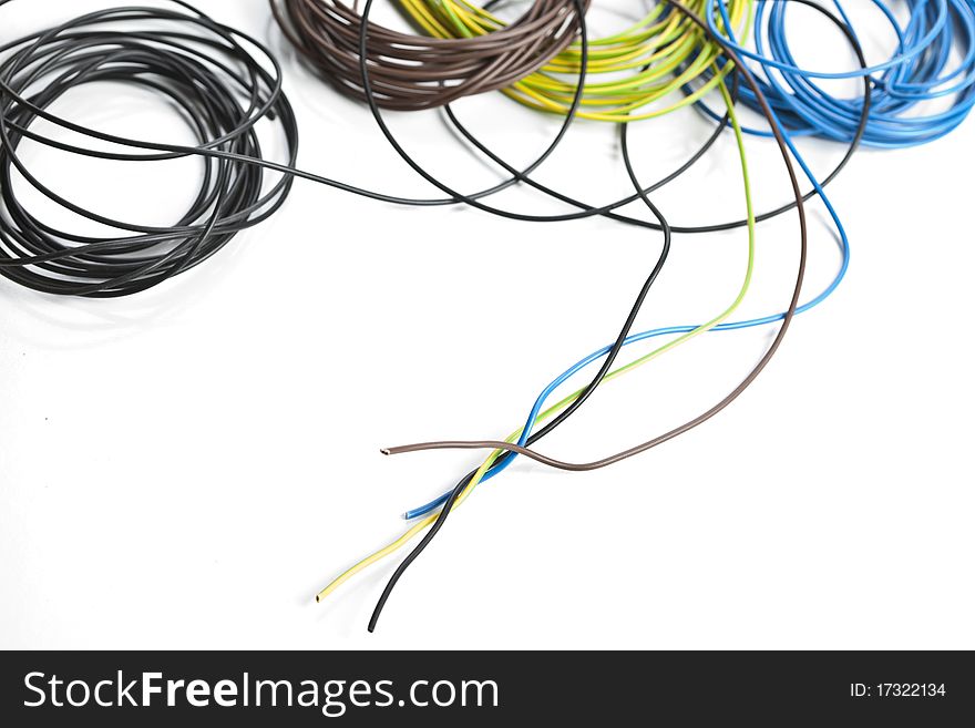 Colorful coils of cables on a white background