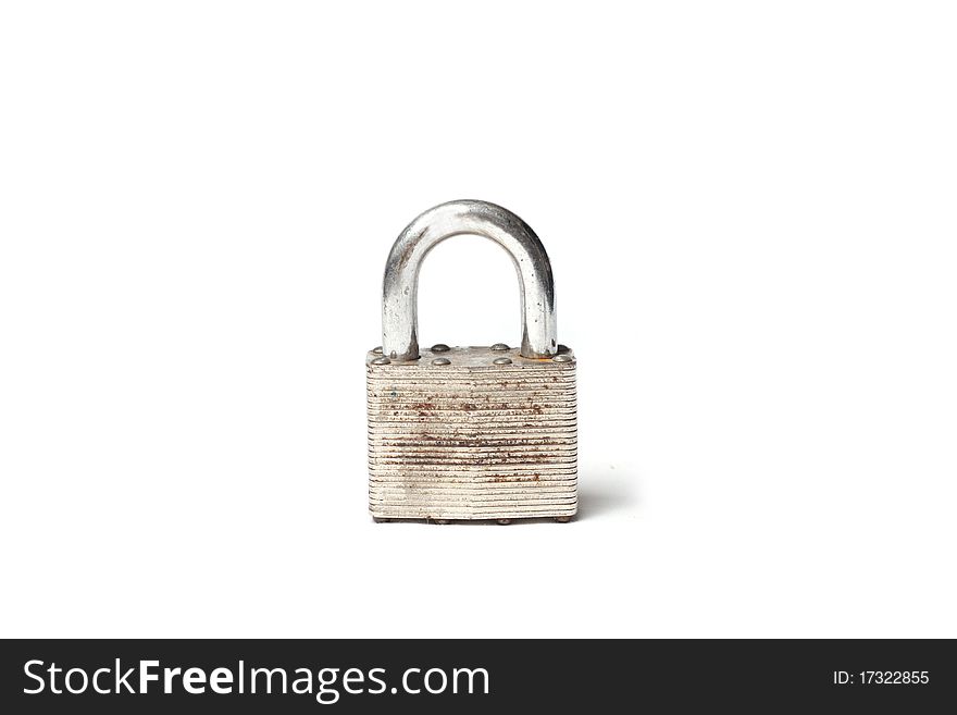 A rusty locked padlock on a white background. A rusty locked padlock on a white background