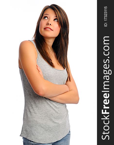 Isolated model crosses her arms and stands confident. Isolated model crosses her arms and stands confident