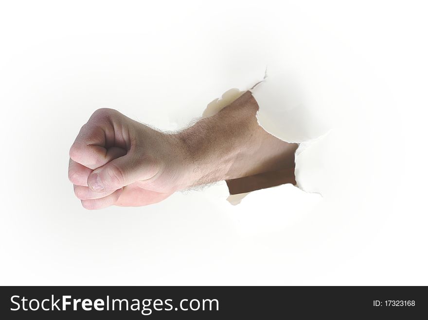 Hand punching through paper on white background