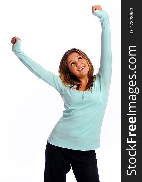 Young isolated model stretches her arms up in the air. Young isolated model stretches her arms up in the air