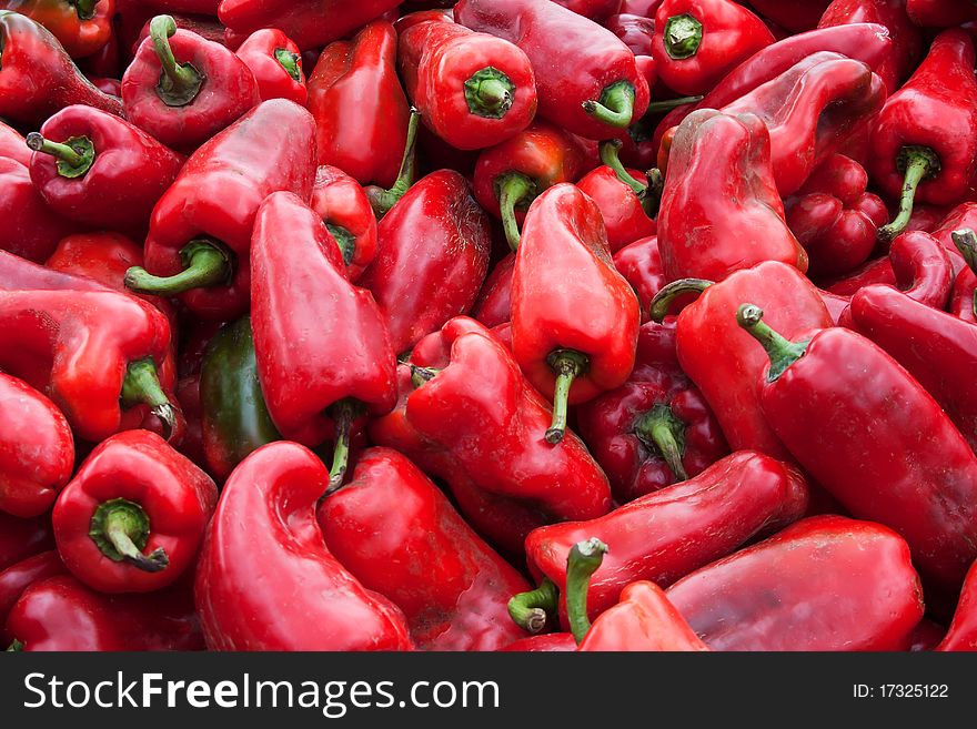 Full frame shot of a bunch of red peppers.