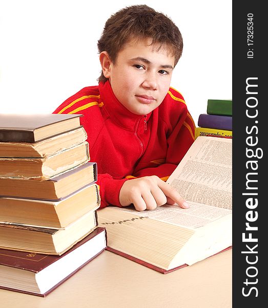 The boy with books in the library on a white background. The boy with books in the library on a white background