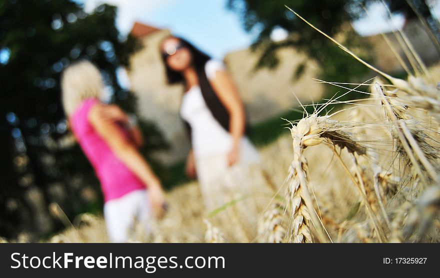 Two Girls In Wheat Field