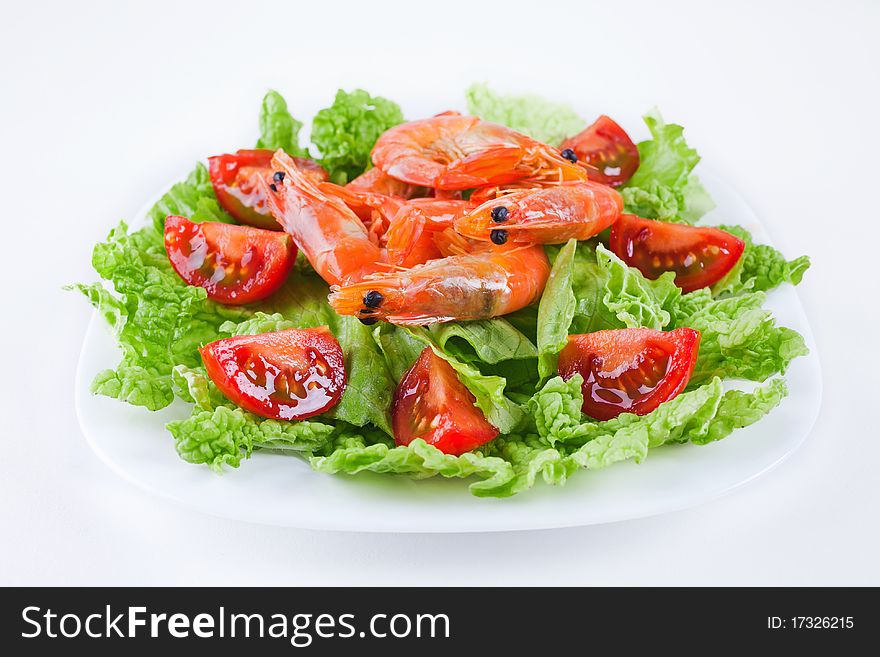 Shrimp with lettuce leaves and cherry tomato