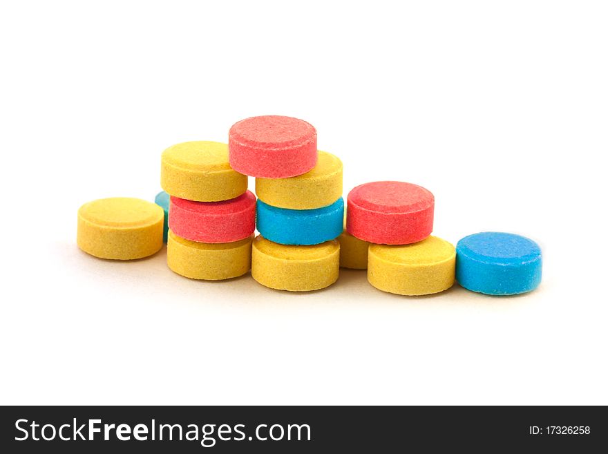 Color pills isolated on white