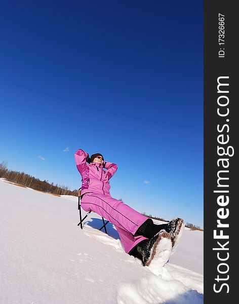 Young attractive girl on winter fishing. Young attractive girl on winter fishing