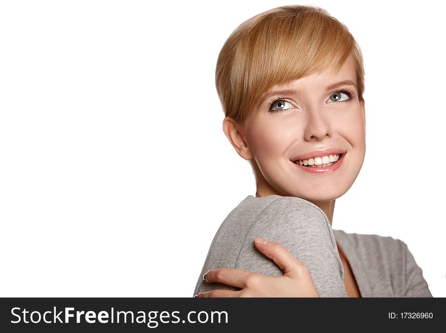 Portrait of a blond smiling woman looking at copyspace, isolated on white background. Portrait of a blond smiling woman looking at copyspace, isolated on white background