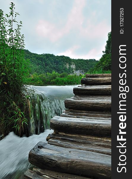 Wooden Stair In Spring Forest Near Stream