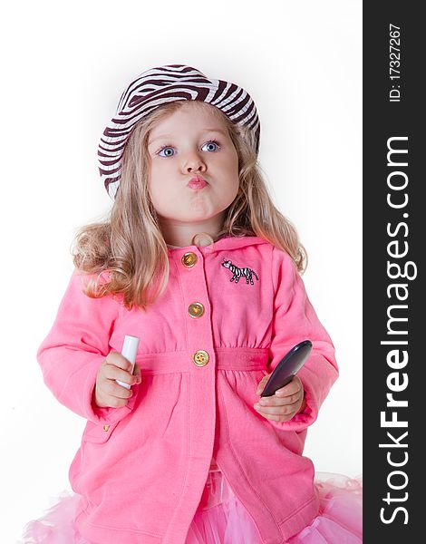 Fashionable little girl sending a kiss