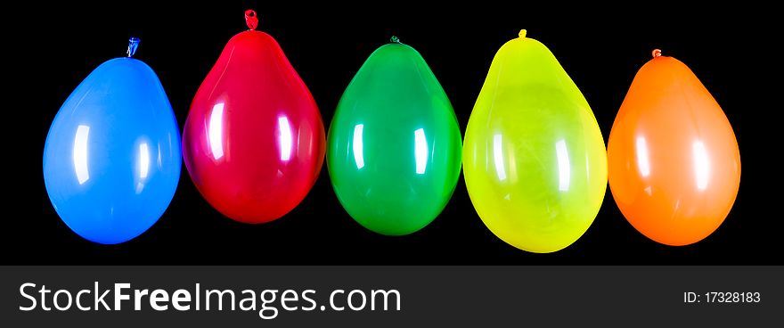 Colorful balloons on a black background