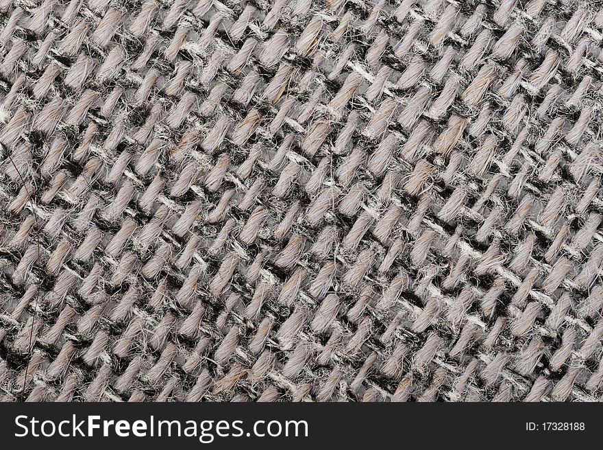 Background with grey rough fabric