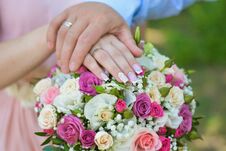 Wedding Rings In Flowers Stock Image