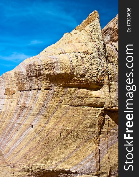 Sandstone rock formations imitate shark fins. Sandstone rock formations imitate shark fins