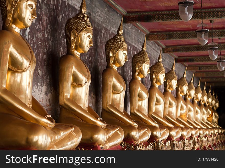 Row of Golden Buddha Statues