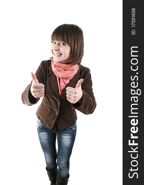 Closeup portrait of a beautiful young woman in a brown coat showing thumbs up sign
