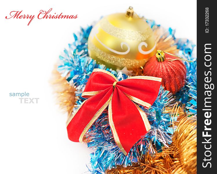 Christmas decoration baubles and red bow isolated on white background with copy space for text