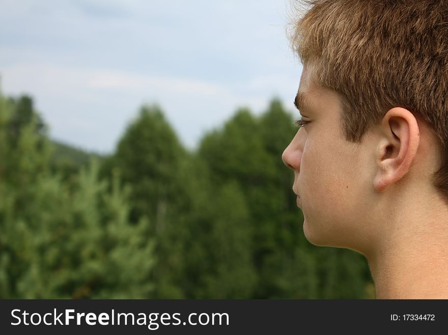 A boy portrait in the nature