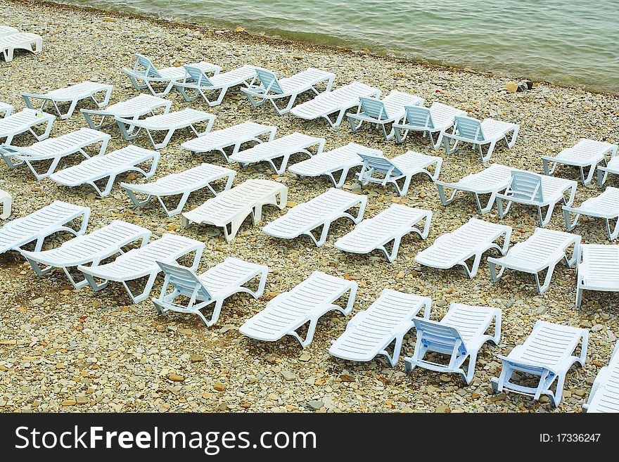 The image of beach-beds at an empty beach