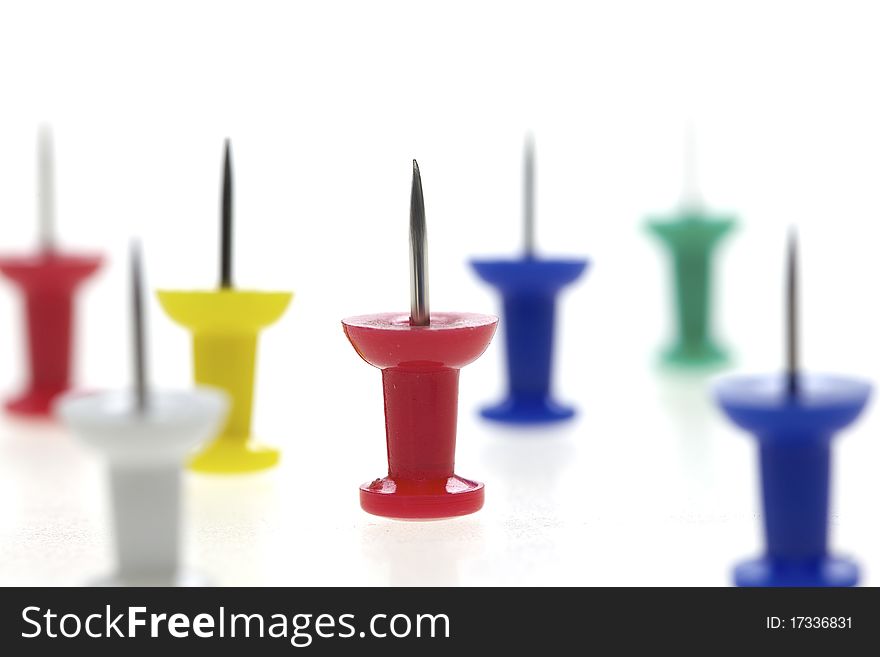 Colorful push pins - multicolored pins isolated on white. Colorful push pins - multicolored pins isolated on white