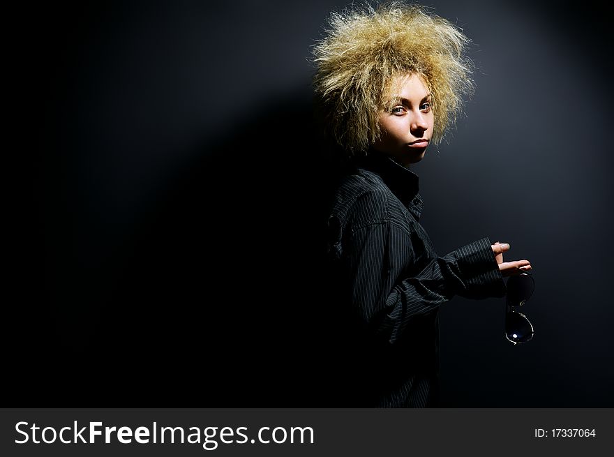 Portrait of the girl with a mad hairdress. Portrait of the girl with a mad hairdress