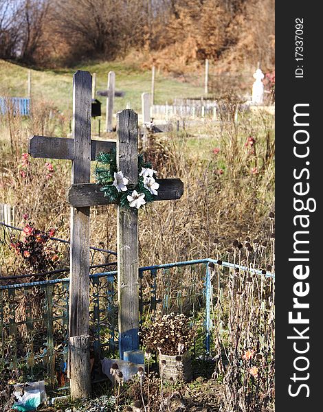 Wood crosses in a typical orthodox graveyard located in the Carpathians hills, Transylvania