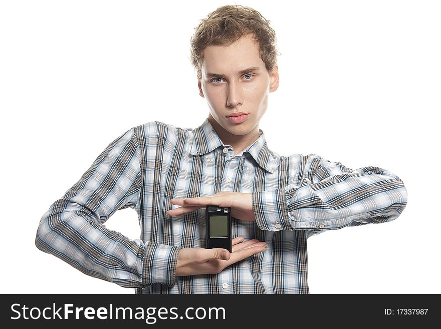 Young man with mobile phone over white