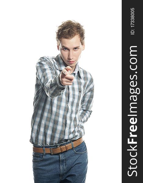 Young man pointing over white