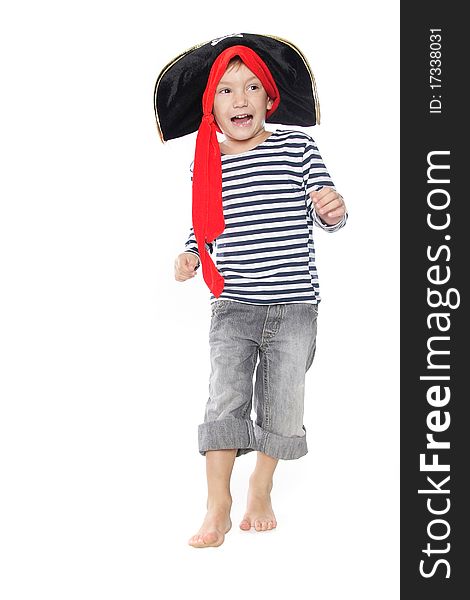 Boy dressed as pirate over white