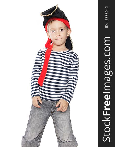 Boy dressed as pirate over white