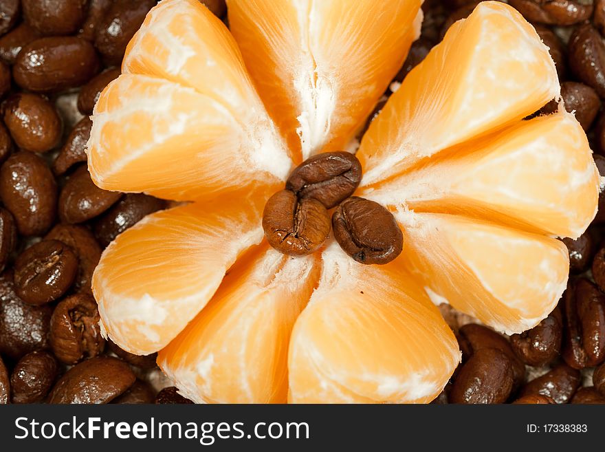 Cleared tangerine on the fragrant fried coffee beans. Cleared tangerine on the fragrant fried coffee beans