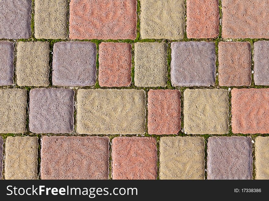 Colorful sidewalk bricks on the beach