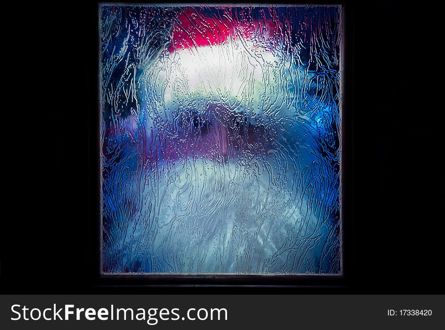 Santa Claus behind the glass or Santa Claus is frozen in ice