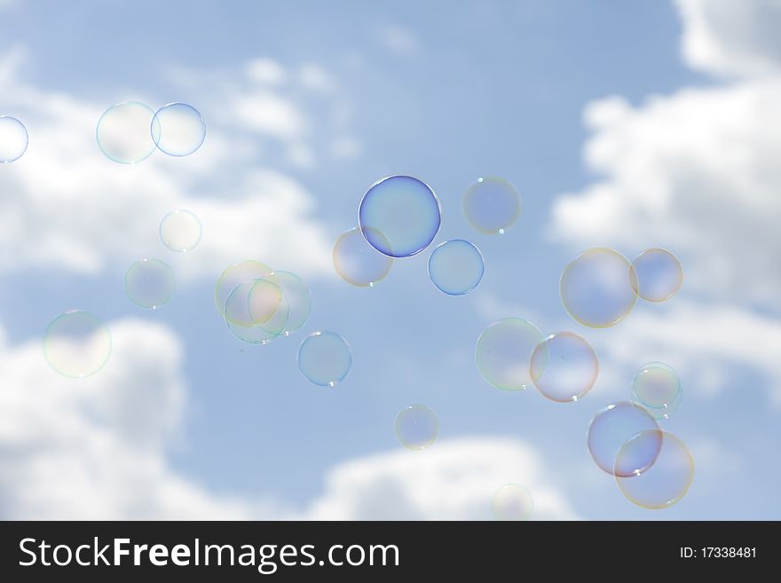 Soap bubbles flying in the sky