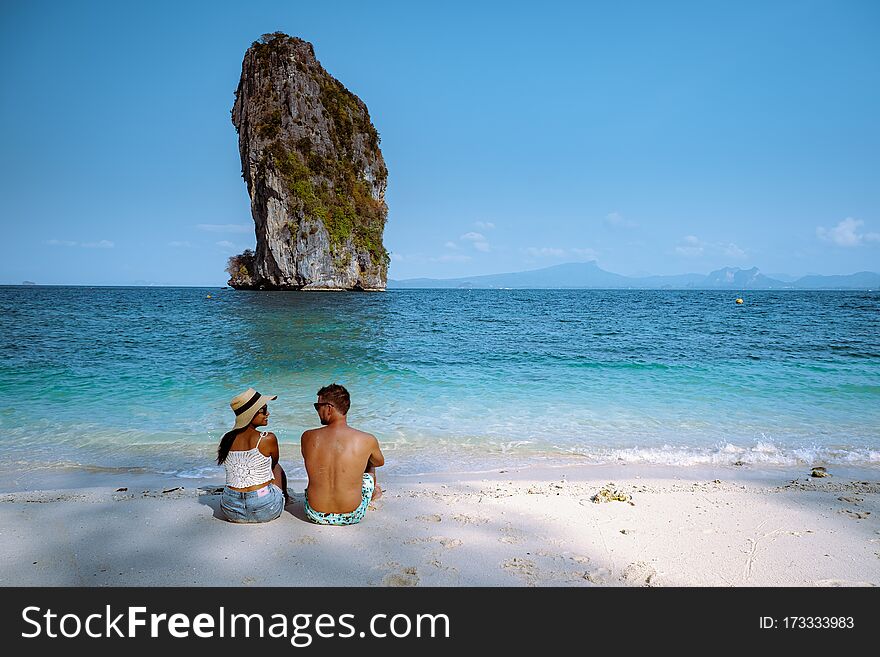 Couple Men And Woman On The Ebach, Koh Poda Krabi Thailand, White Beach With Crystal Clear Water In Krabi Thailand