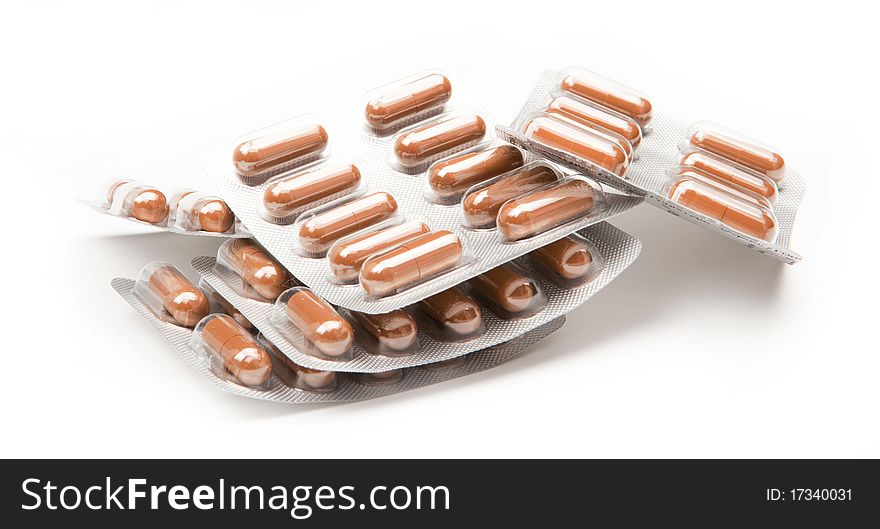 Medicine tablets and medicine equipment isolated on white